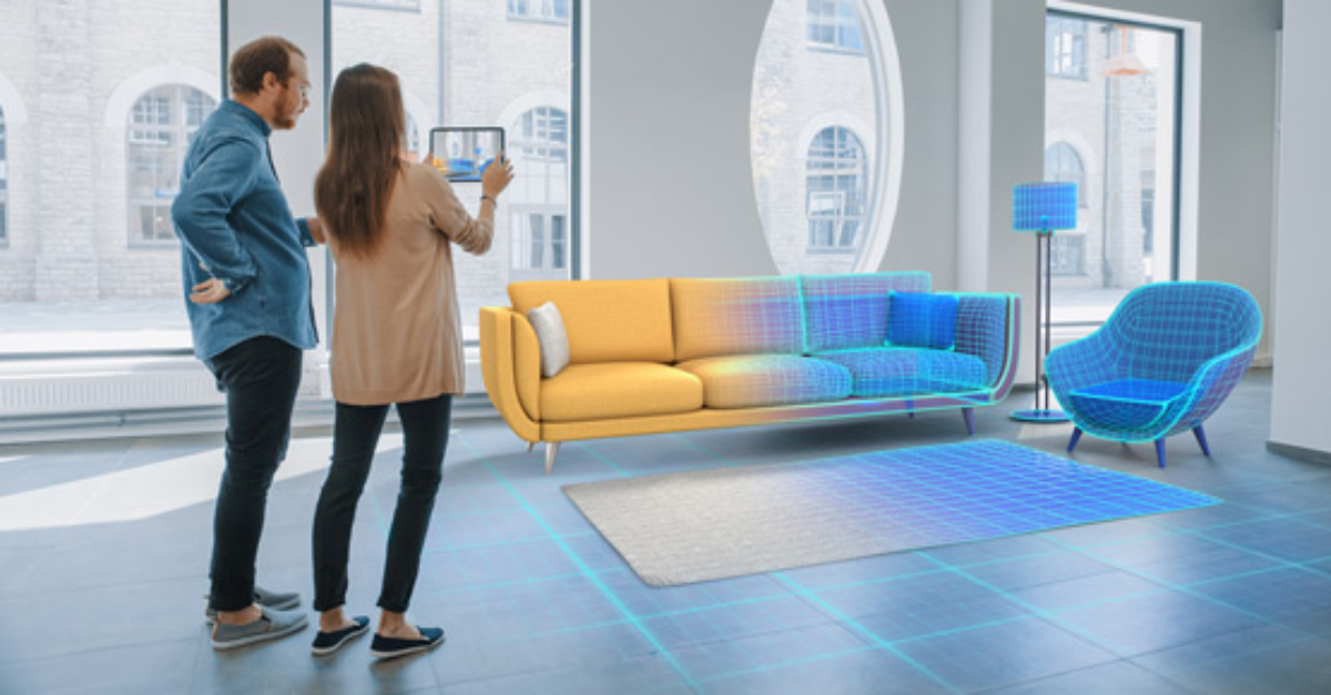 Couple in room with digital furnishings